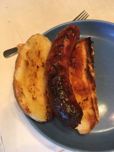 perfectly grilled bratwurst with garlic toasted bun
