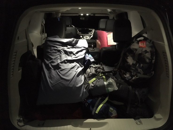 Van packed for camp in early morning
