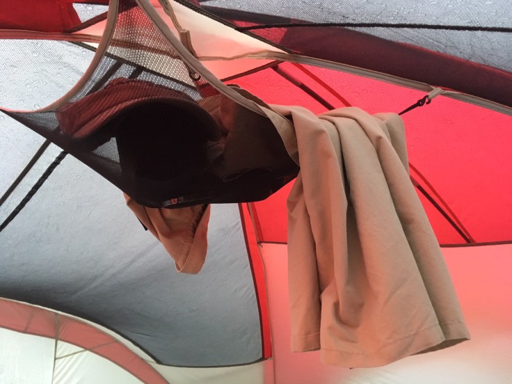 gear stored overhead in tent